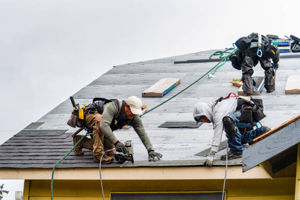 Professional Gutter Installation technician working in Sanibel, FL